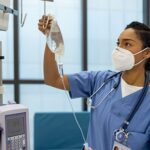 Nurse hanging IV | OBHG