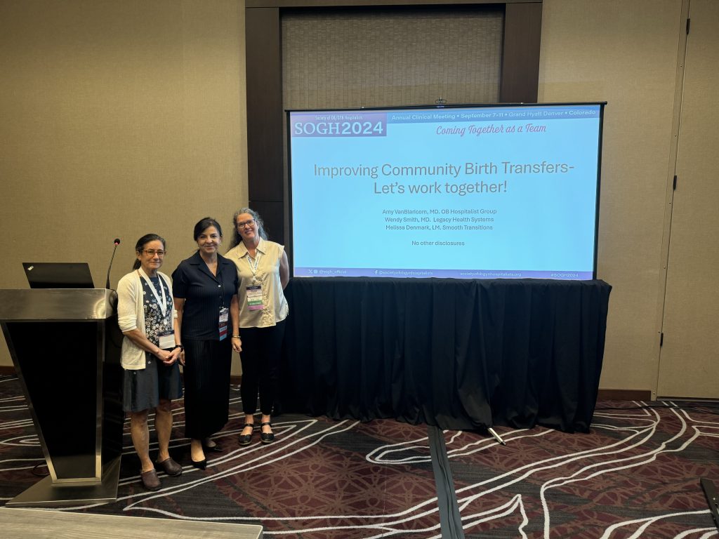 Dr. Amy VanBlaricom of OBHG stands with Dr. Wendy Smith of Legacy Health Systems and Licensed Midwife Melissa Denmark in front of their presentation titled "Improving Community Birth Transfers - Let's Work Together!"